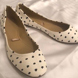 Black and white ballet flats